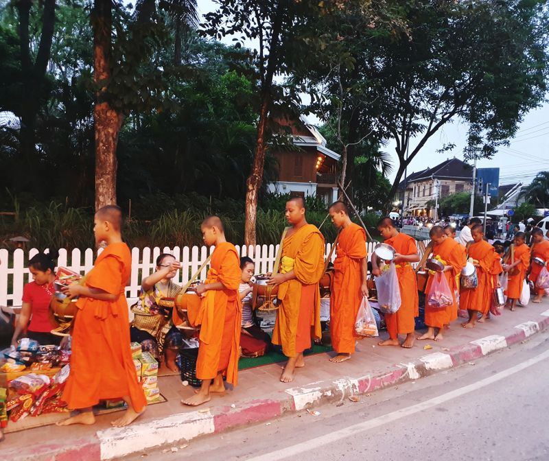 Tak Bat alms giving ceremony Luang Prabang